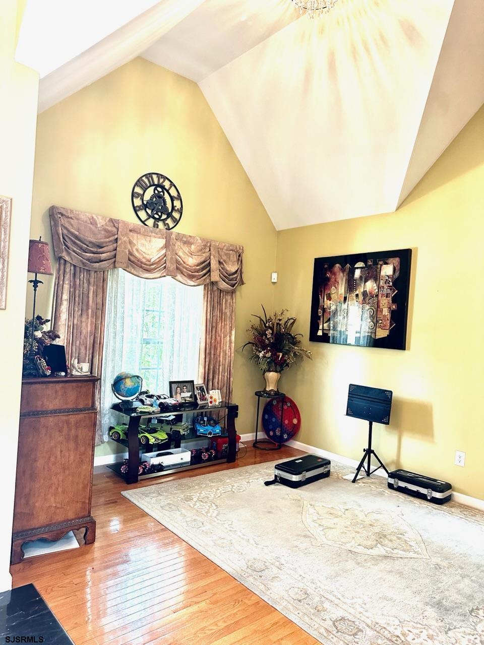 9 Ruth Court Absecon, NJ 08201 - Photo 3 of 38 a view of a room with gym equipment