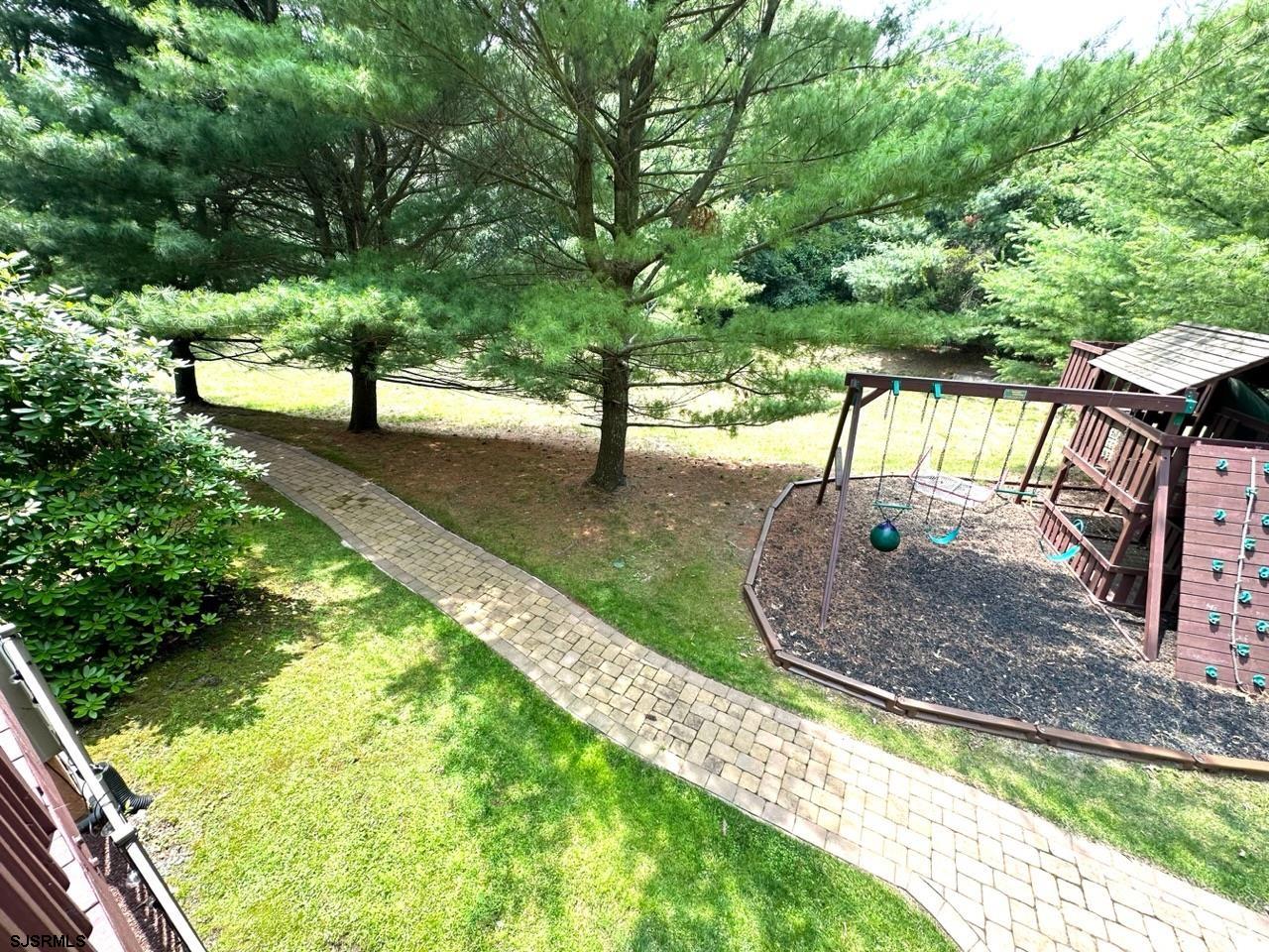 9 Ruth Court Absecon, NJ 08201 - Photo 34 of 38 a view of a yard with plants