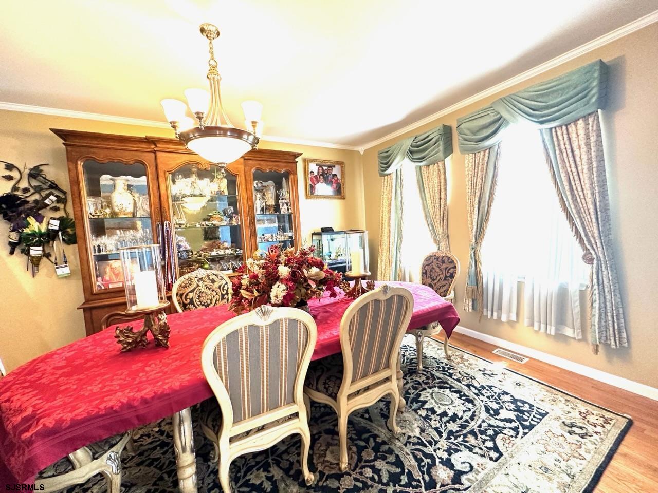 9 Ruth Court Absecon, NJ 08201 - Photo 6 of 38 a view of a dining room with furniture window and outside view