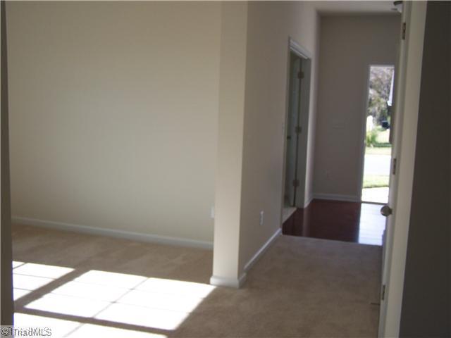 2516 Covington Loop Graham, NC 27253 - Photo 11 of 16 Other. Hallway Down Stairs/ Entry