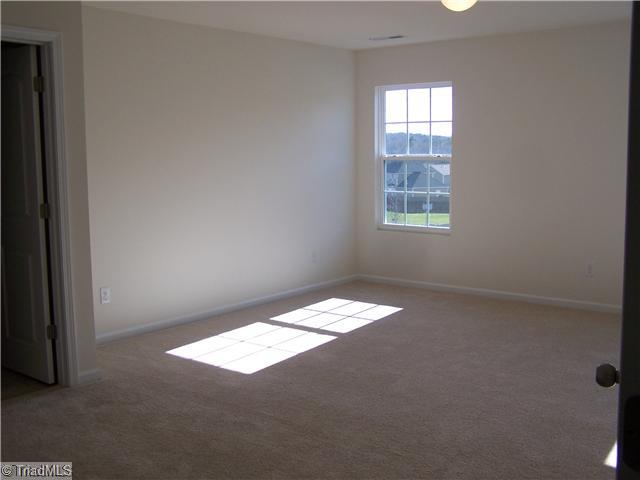 2516 Covington Loop Graham, NC 27253 - Photo 12 of 16 Master Bedroom. Large Master with Great Closets Bath with Double Vanity Sinks and Linen Closet! Lots of Space!!