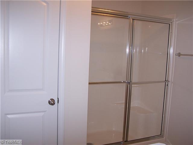 2516 Covington Loop Graham, NC 27253 - Photo 13 of 16 Master Bath/Spa. Master has Double Vanity Sink and Linen Closet. Very Spacious. Large Walk In Closet off of Master Bath!