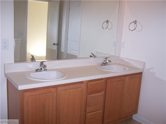 2516 Covington Loop Graham, NC 27253 - Photo 14 of 16 Master Bath/Spa. Double Vanity Sink, Lots of Space in this Bathroom with Large Walk In Closet!