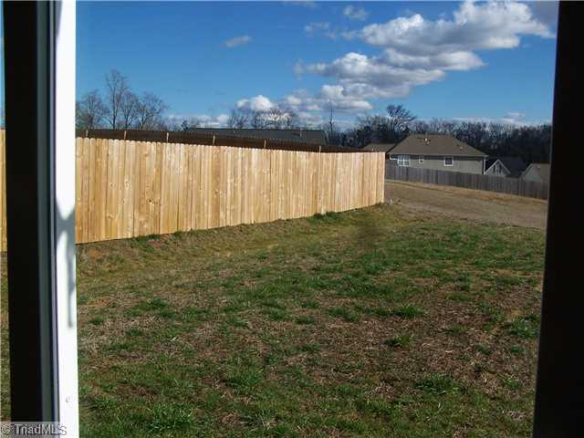 2516 Covington Loop Graham, NC 27253 - Photo 16 of 16 Exterior Front. Large Backyard - Great for Kids and Pets to Play!