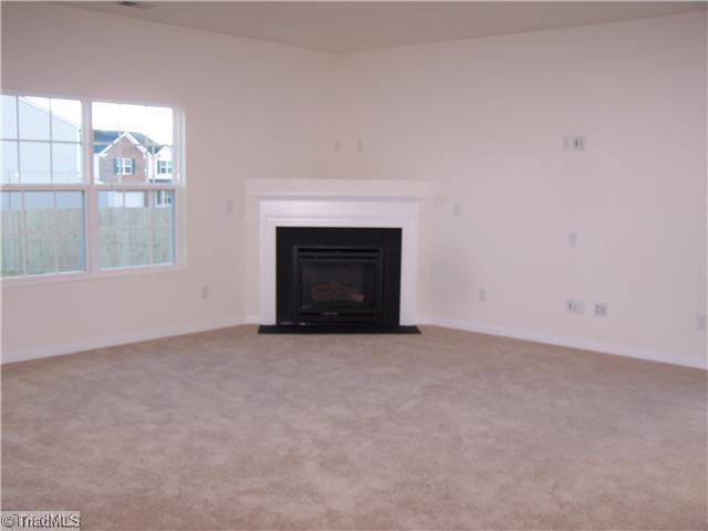 2516 Covington Loop Graham, NC 27253 - Photo 4 of 16 Den/Family/Great Room. Family Room with Fireplace that opens to Kitchen and Breakfast Area! Great for Entertaining!