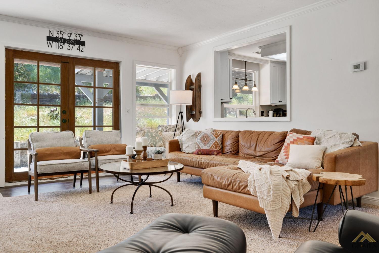 Undisclosed Address Tehachapi, CA 93561 - Photo 13 of 57 a living room with furniture and a large window