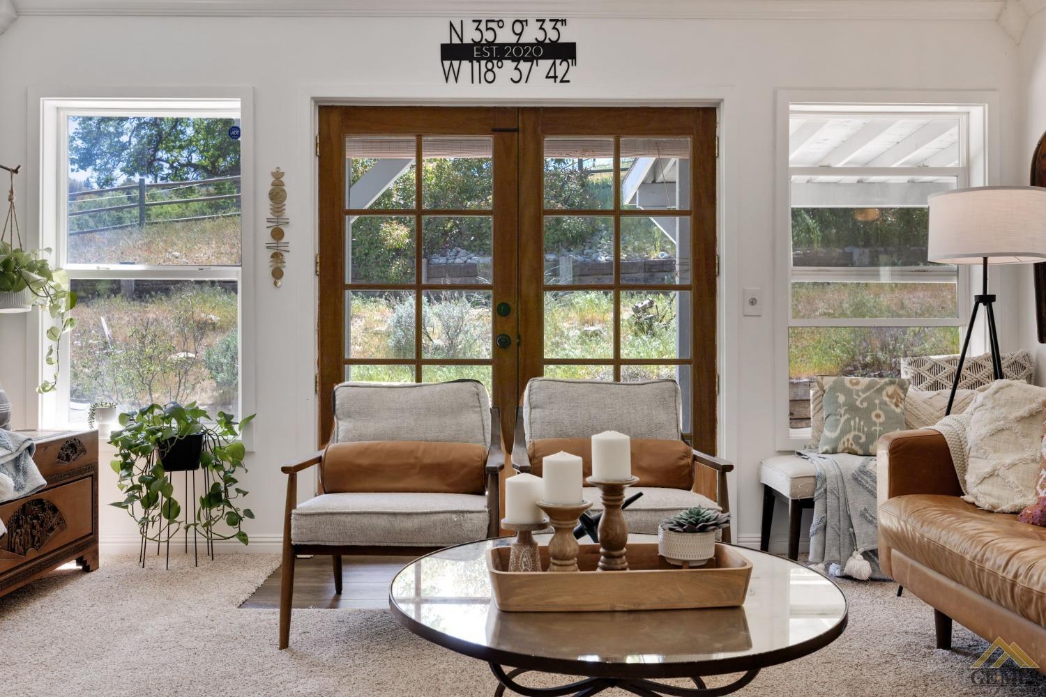 Undisclosed Address Tehachapi, CA 93561 - Photo 17 of 57 a living room with furniture and a large window