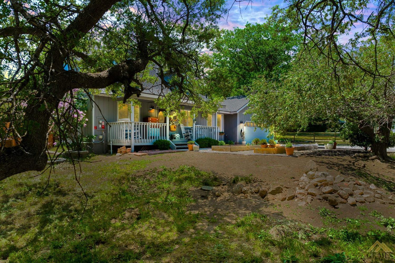Undisclosed Address Tehachapi, CA 93561 - Photo 2 of 57 a view of road with large trees