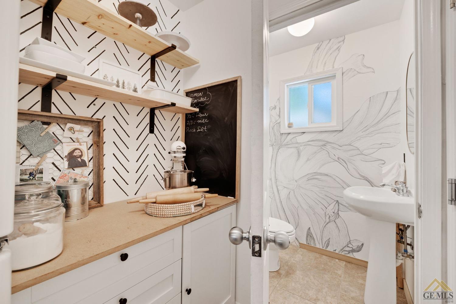 Undisclosed Address Tehachapi, CA 93561 - Photo 25 of 57 a bathroom with a sink vanity granite and a mirror