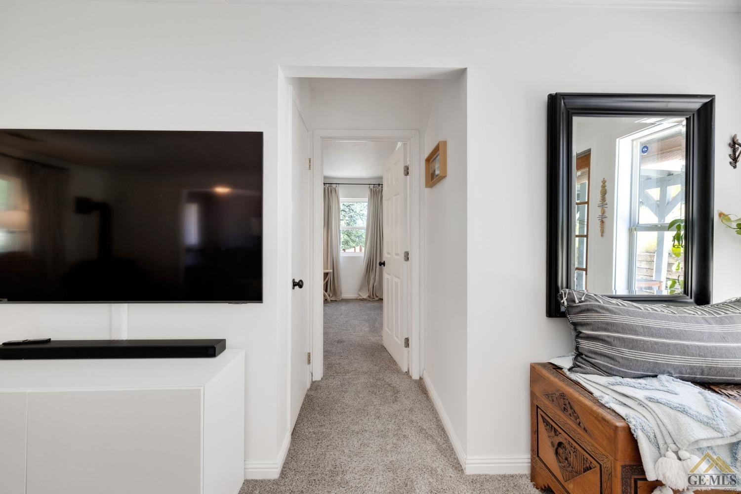 Undisclosed Address Tehachapi, CA 93561 - Photo 26 of 57 a view of hallway with bathroom