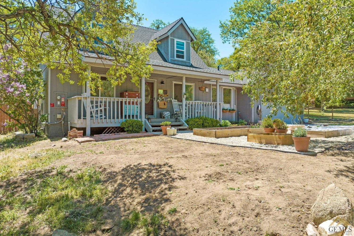 Undisclosed Address Tehachapi, CA 93561 - Photo 3 of 57 a view of a house with a yard and sitting area