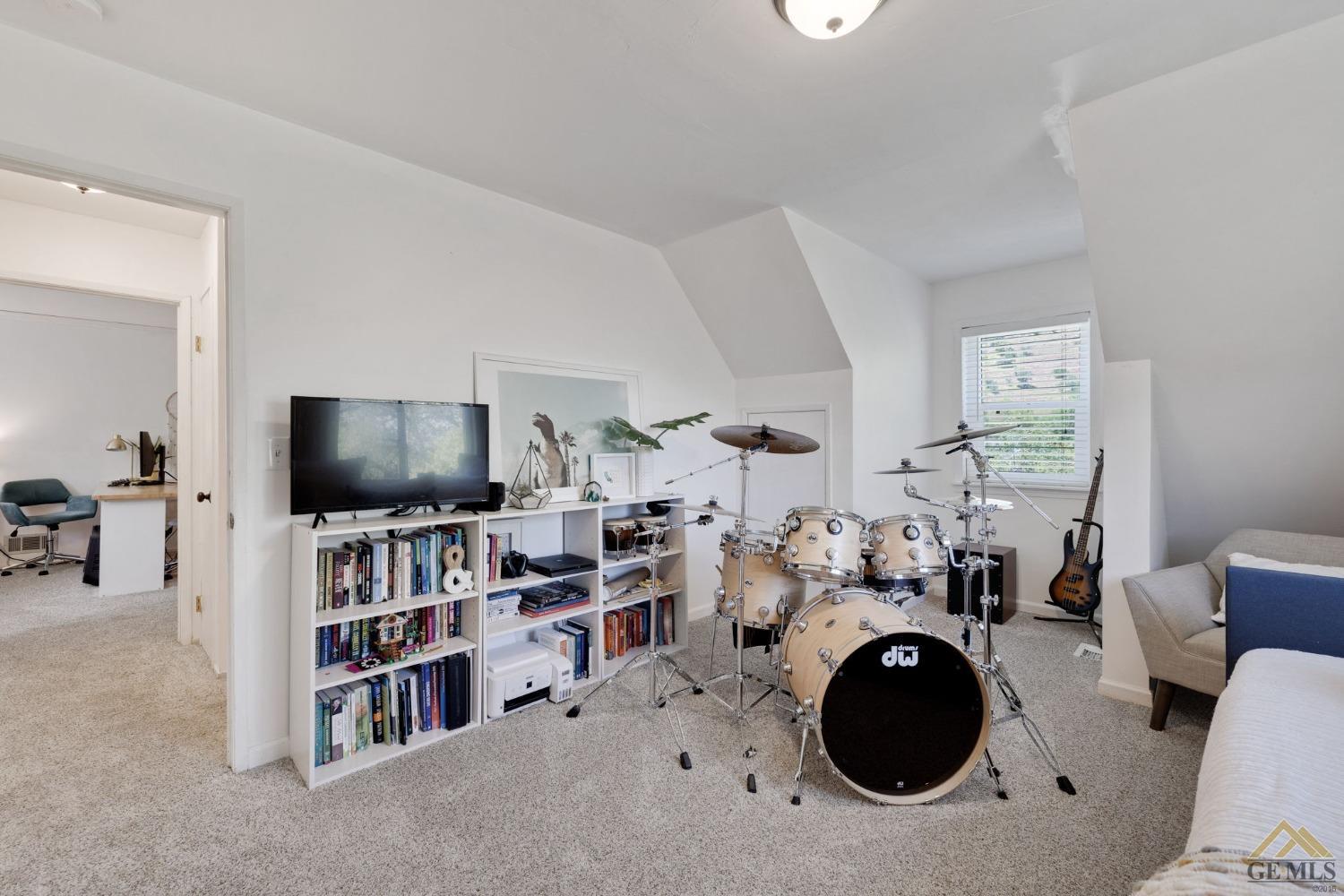 Undisclosed Address Tehachapi, CA 93561 - Photo 32 of 57 a room with furniture and a flat screen tv