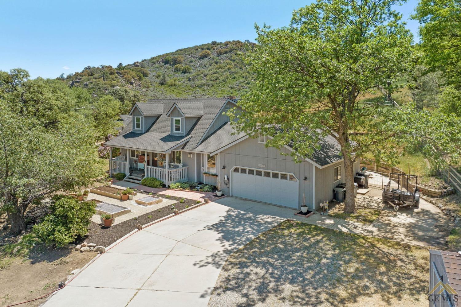 Undisclosed Address Tehachapi, CA 93561 - Photo 4 of 57 a front view of a house with a yard