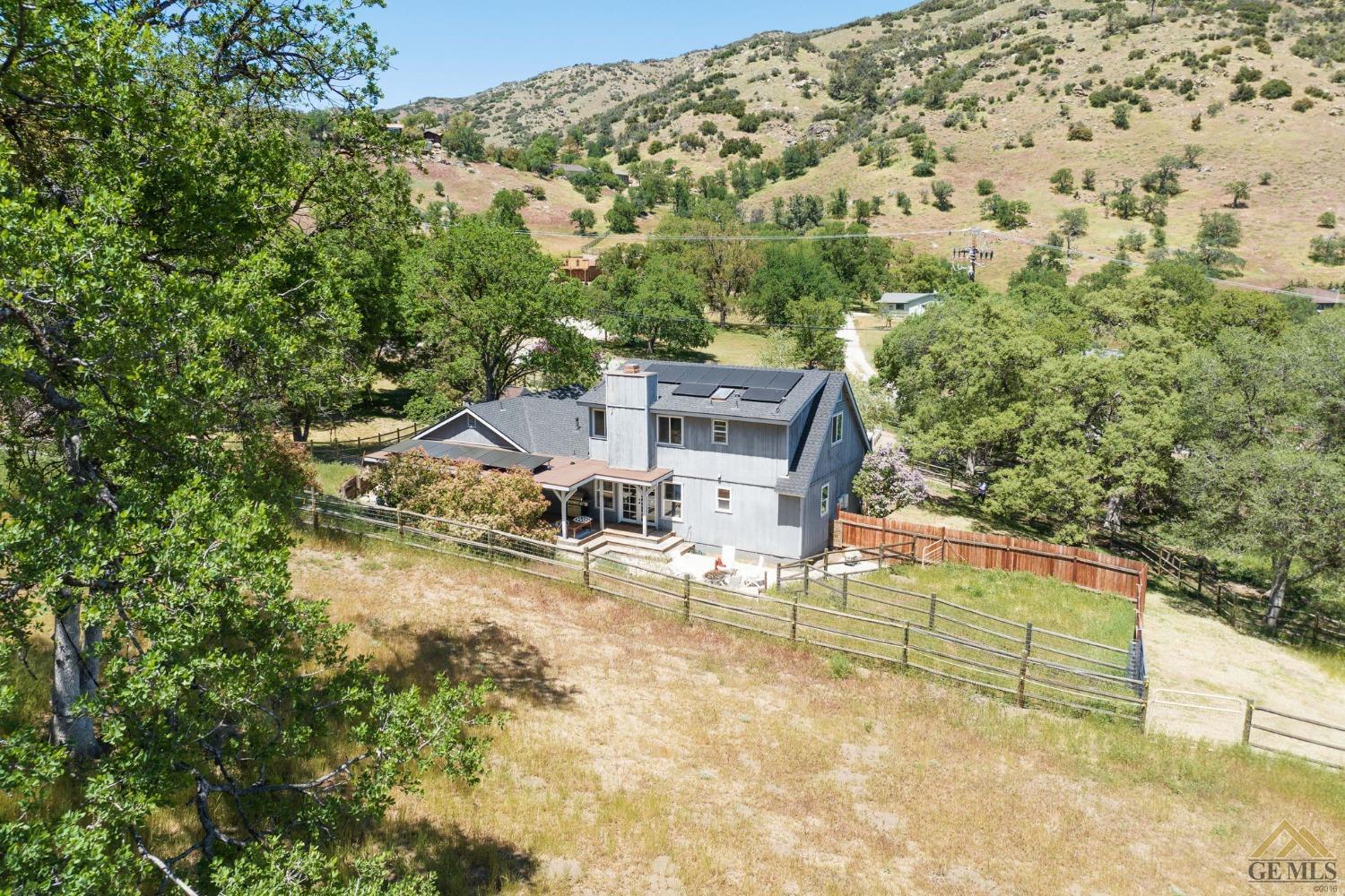 Undisclosed Address Tehachapi, CA 93561 - Photo 44 of 57 an aerial view of a house with a yard basket ball court and outdoor seating
