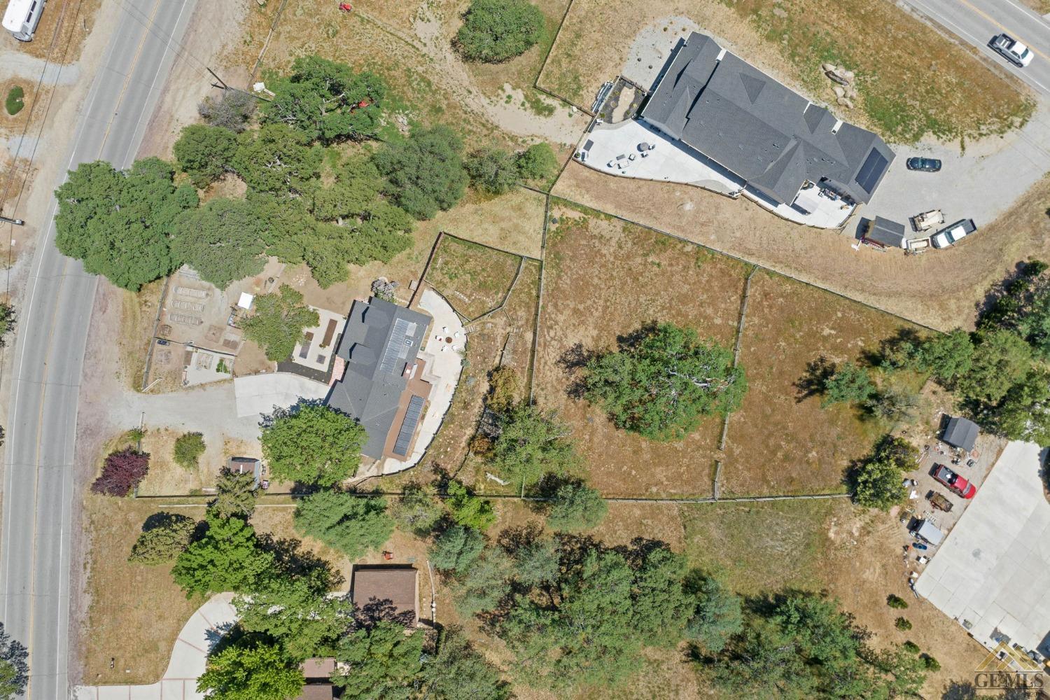 Undisclosed Address Tehachapi, CA 93561 - Photo 52 of 57 an aerial view of a house with a yard