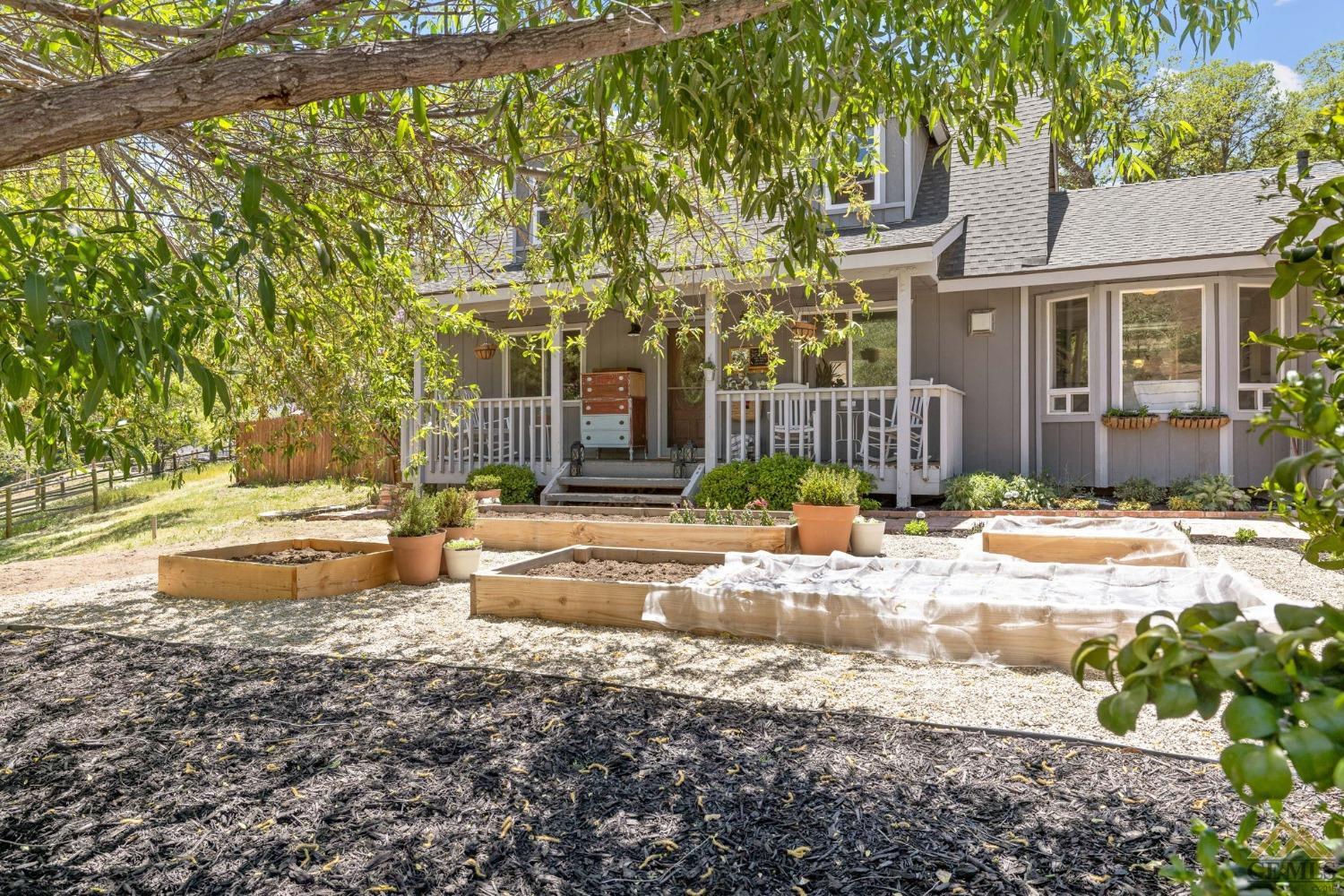 Undisclosed Address Tehachapi, CA 93561 - Photo 7 of 57 a view of a house with a yard and sitting area
