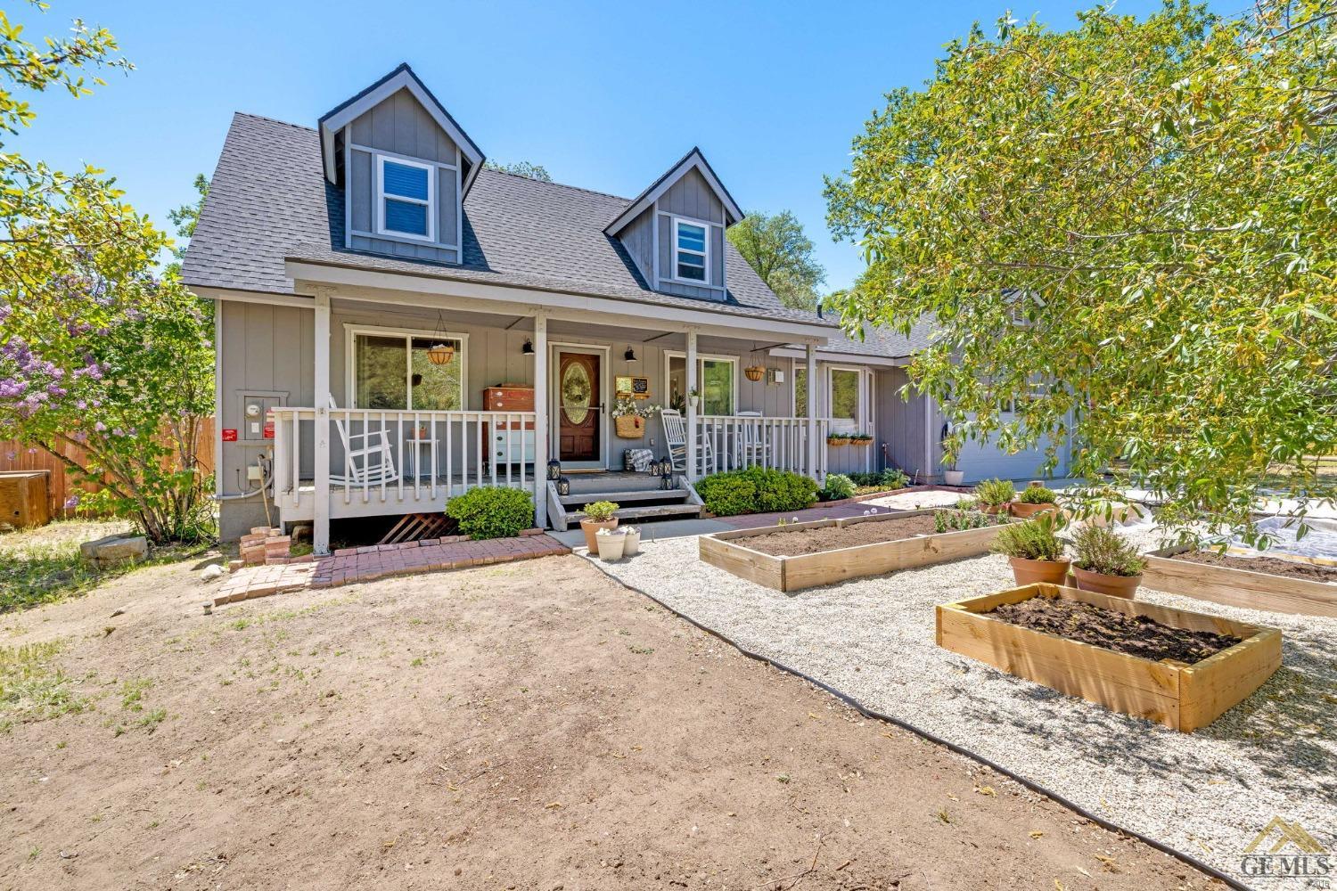 Undisclosed Address Tehachapi, CA 93561 - Photo 8 of 57 front view of a house with a patio