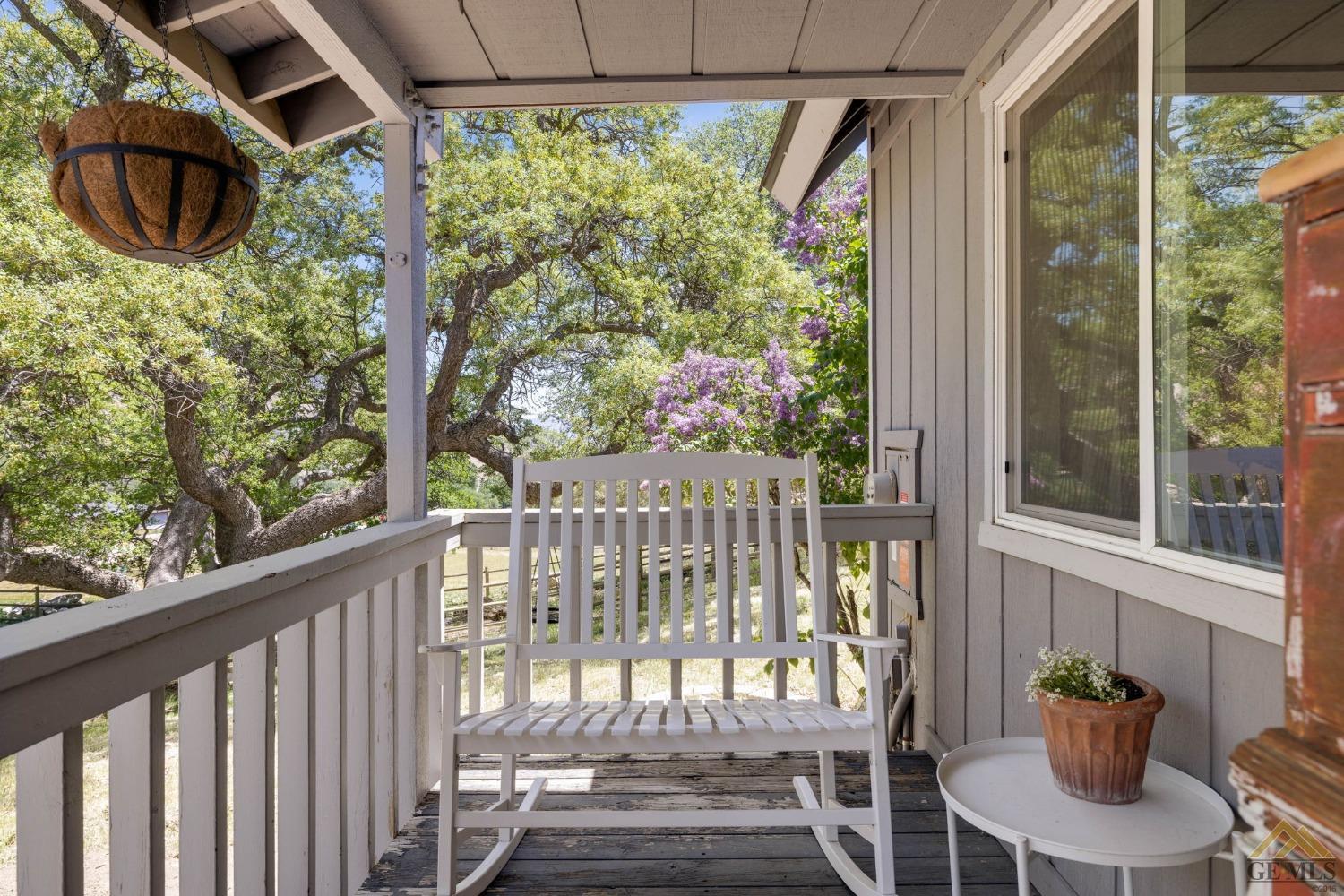 Undisclosed Address Tehachapi, CA 93561 - Photo 9 of 57 a view of a chair and table in the balcony