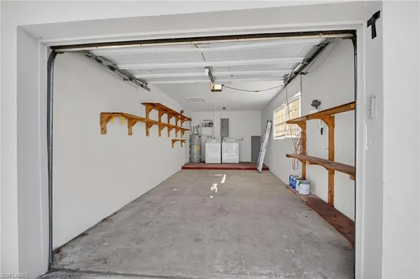 a view of a garage with stairs