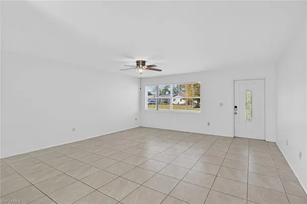 an empty room with cabinet