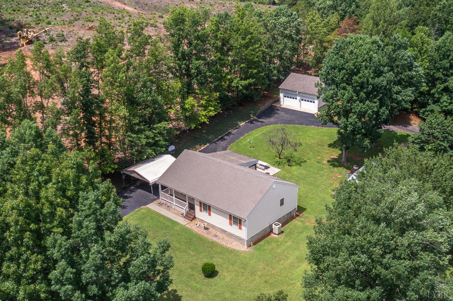 1936 Bear Creek Road Rustburg, VA 24588 - Photo 38 of 44 an aerial view of a house with a garden