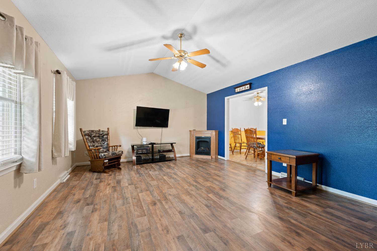 1936 Bear Creek Road Rustburg, VA 24588 - Photo 6 of 44 a living room with furniture and a flat screen tv