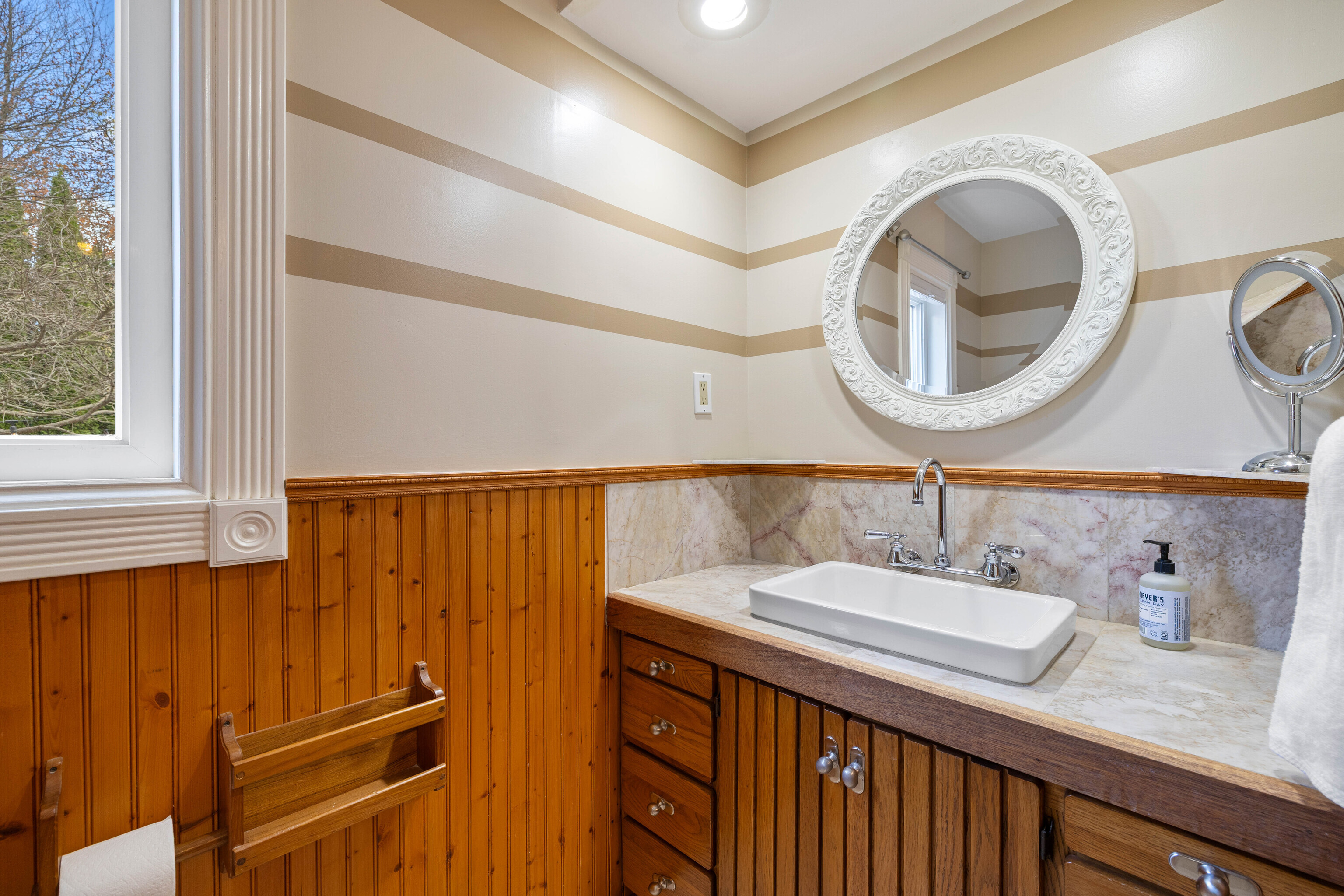 46 Old Black Point Road East Lyme, CT 06357 - Photo 24 of 40 a bathroom with a sink and a mirror