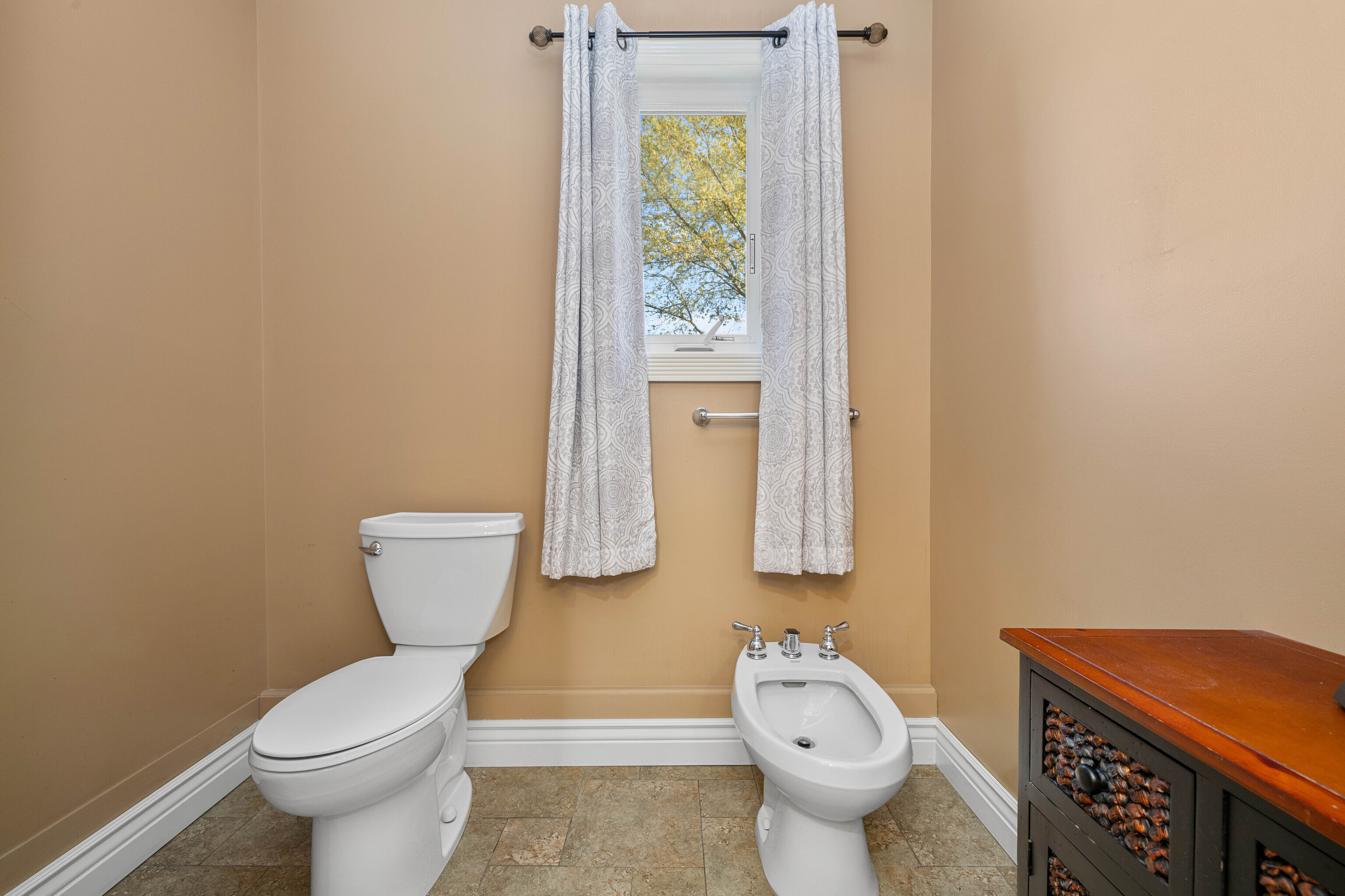 46 Old Black Point Road East Lyme, CT 06357 - Photo 31 of 40 a white toilet sitting next to a bathroom sink