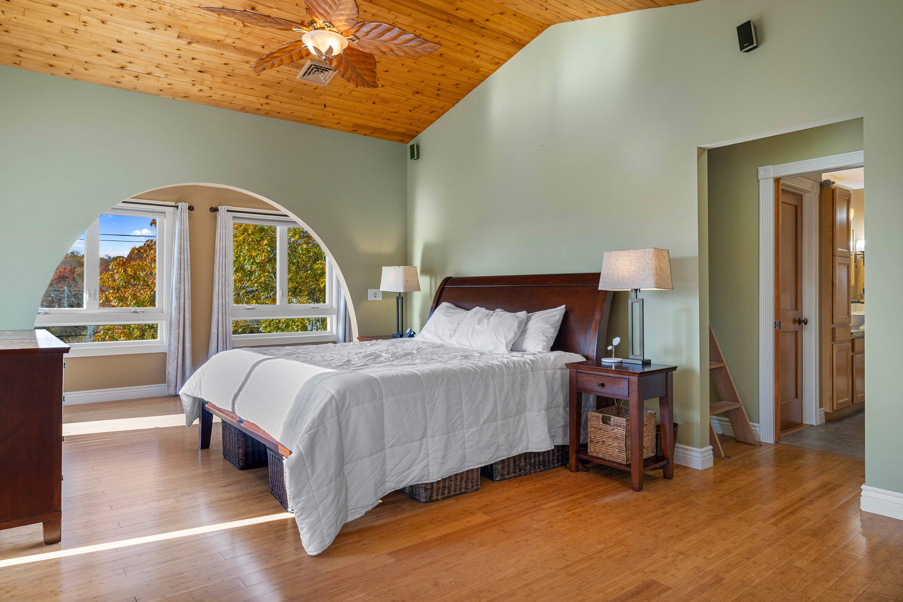 46 Old Black Point Road East Lyme, CT 06357 - Photo 35 of 40 a spacious bedroom with a bed and a large window