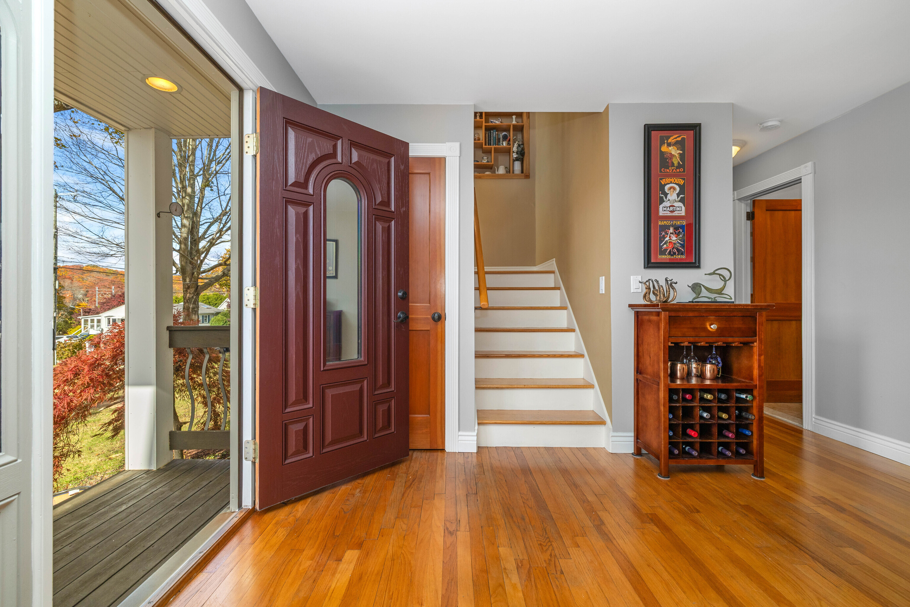 46 Old Black Point Road East Lyme, CT 06357 - Photo 10 of 40 a view of front door with wooden floor and stairs