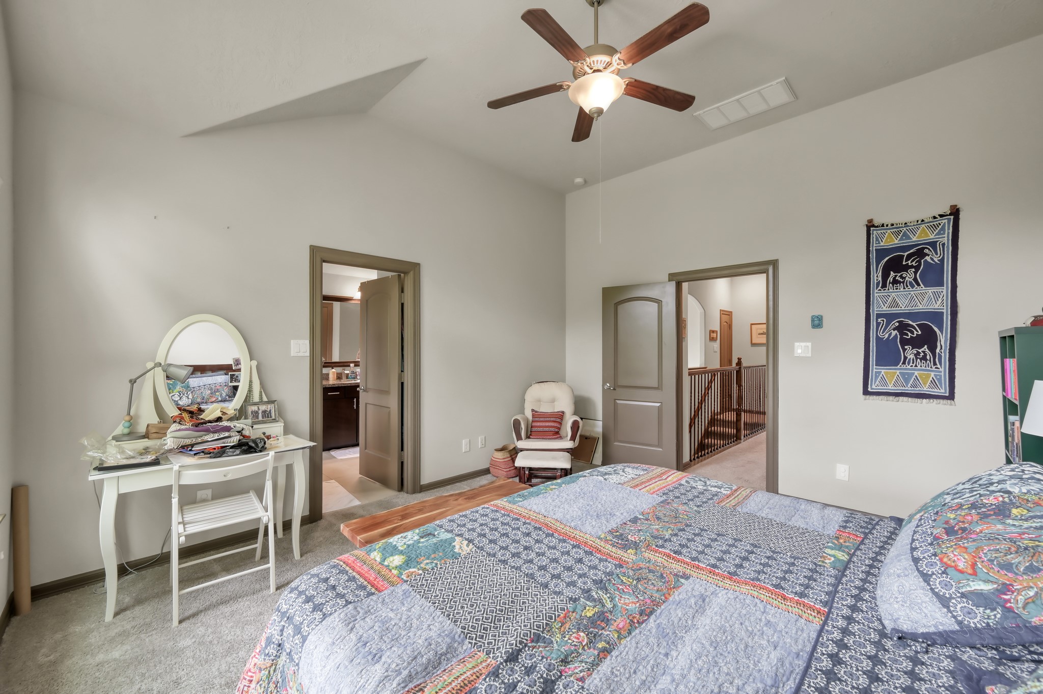 18 Aventura Place Spring, TX 77389 - Photo 26 of 43 a bedroom with a bed and a dresser in it