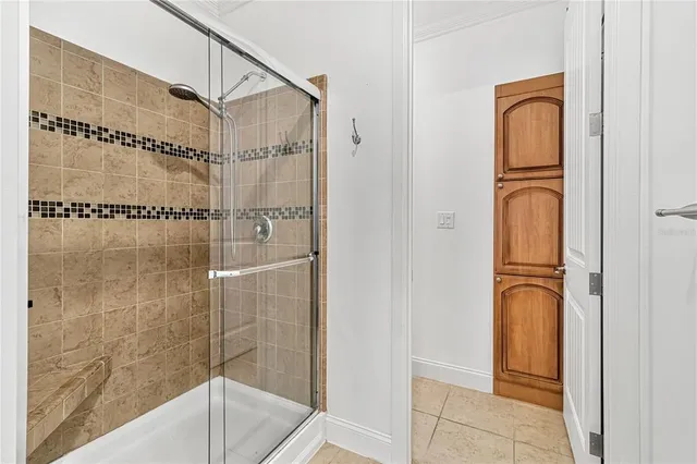 a white toilet sitting next to a shower curtain