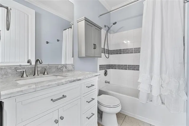 a view of a chair and table in a backyard