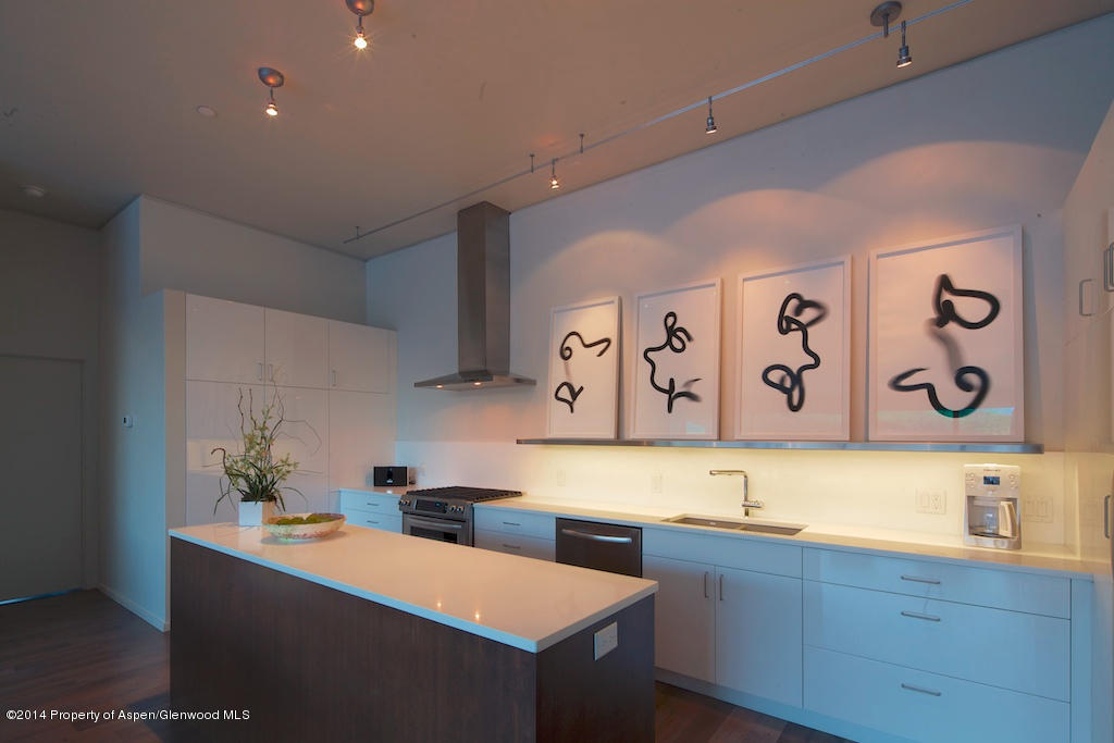 200 Evans Road, Unit 101 Basalt, CO 81621 - Photo 19 of 53 a kitchen with a sink and cabinets