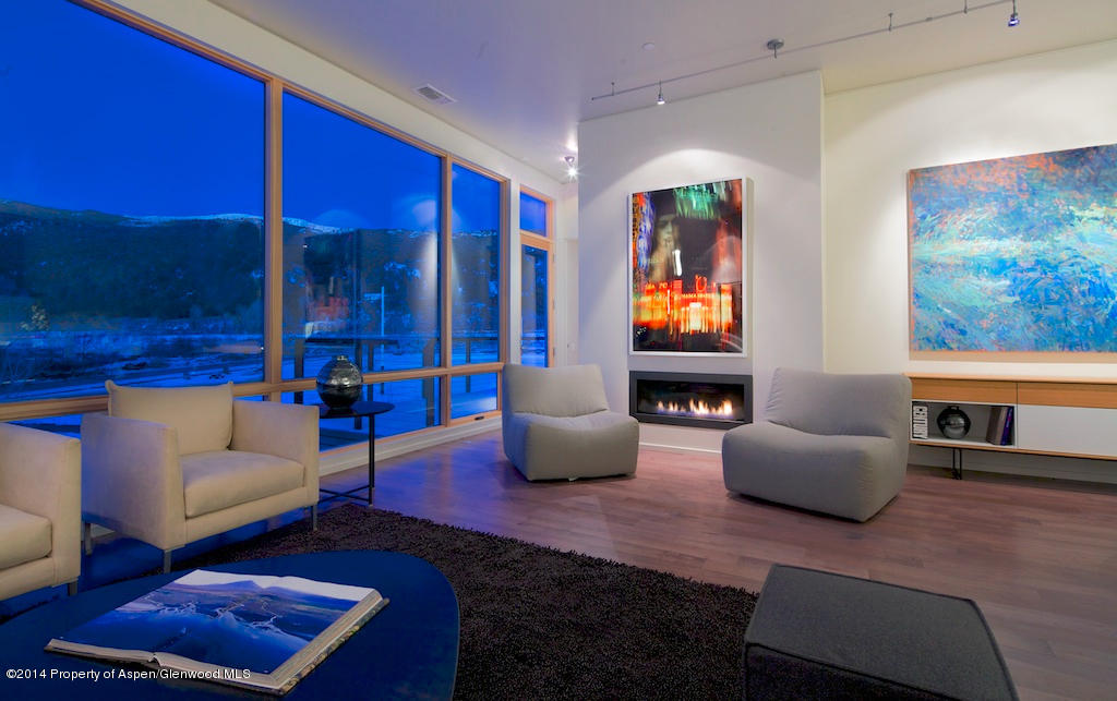 200 Evans Road, Unit 101 Basalt, CO 81621 - Photo 21 of 53 a living room with furniture and wooden floor