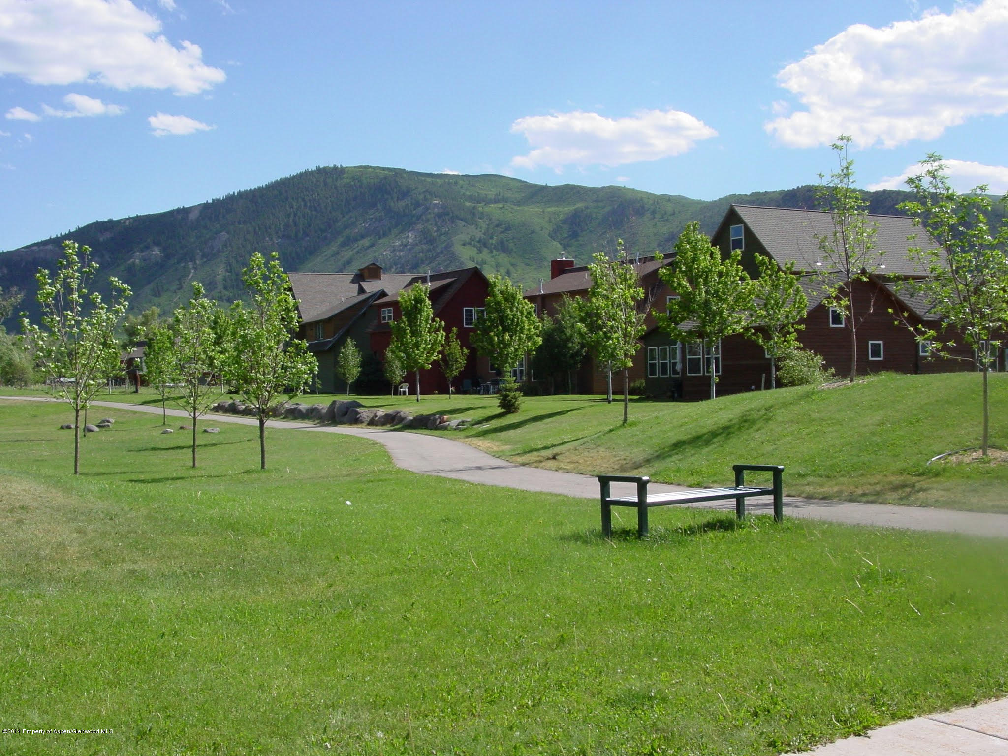 200 Evans Road, Unit 101 Basalt, CO 81621 - Photo 41 of 53 a view of a bench in a park