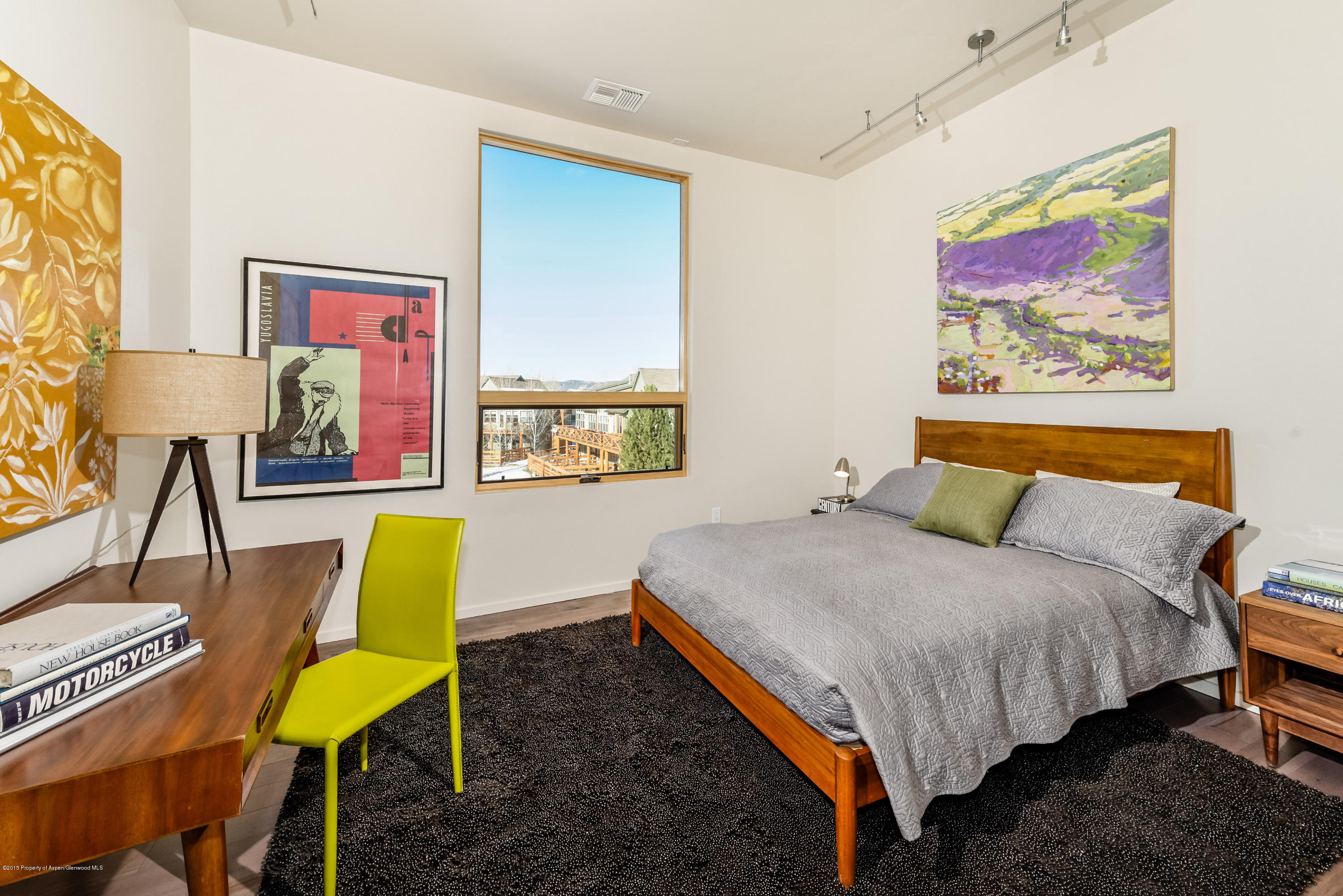 200 Evans Road, Unit 101 Basalt, CO 81621 - Photo 10 of 53 a bedroom with a bed dresser and a couch