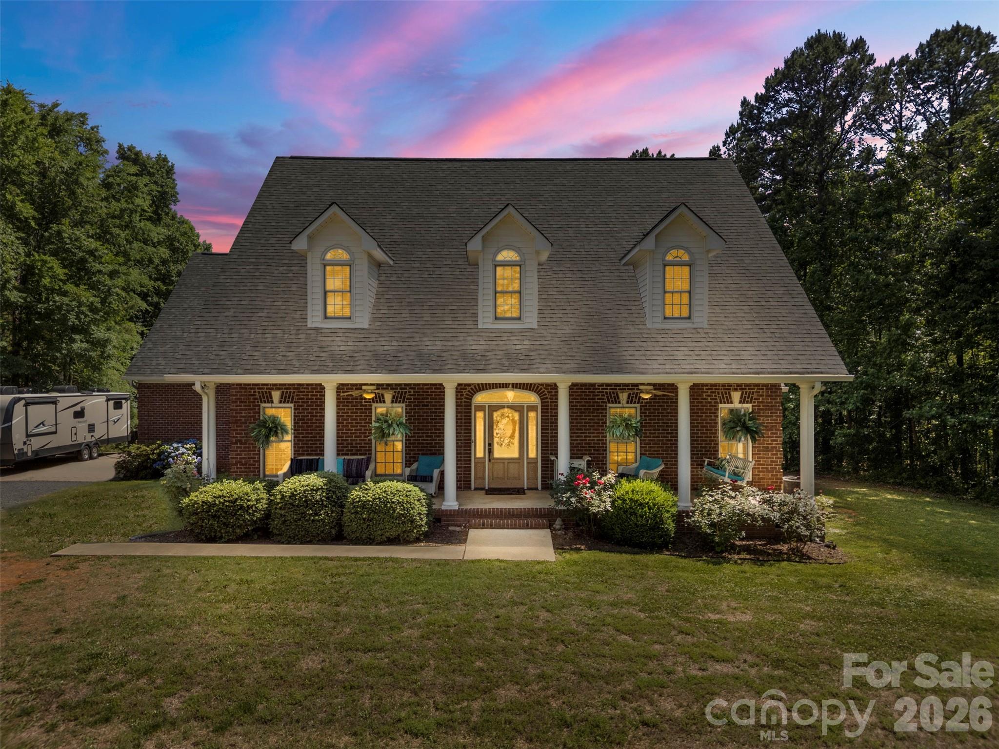 710 Sleepy Hollow Road Midland, NC 28107 - Photo 2 of 29 a front view of a house with garden