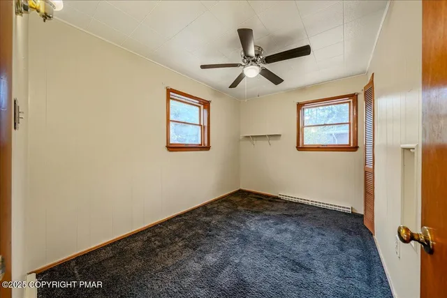 a view of a big room with wooden floor