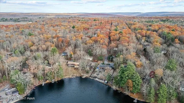 an aerial view of residential house with outdoor space