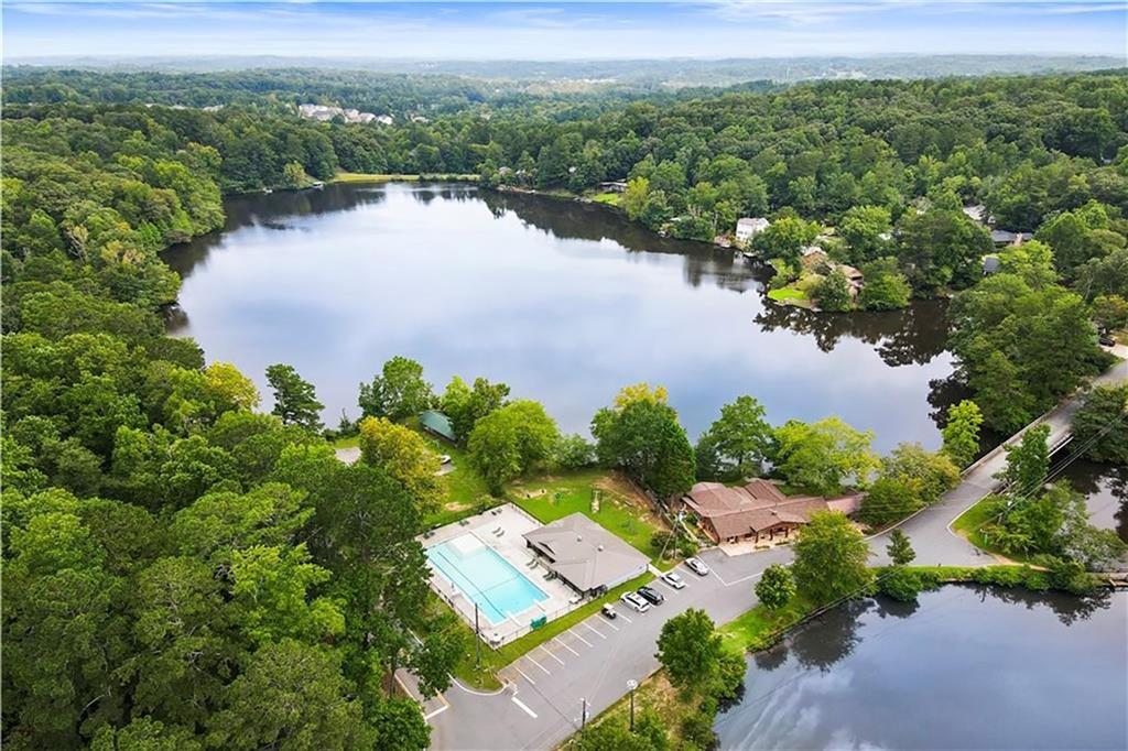 110 Cherry Street Roswell, GA 30075 - Photo 2 of 10 an aerial view of a house with a garden and lake view