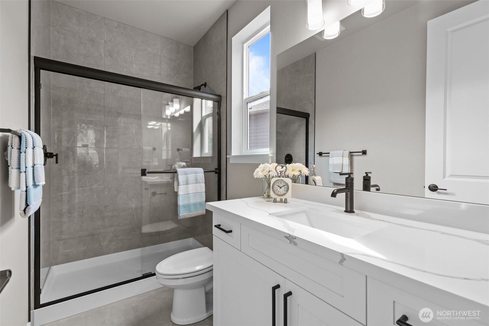 24224 Brier Road Brier, WA 98036 - Photo 14 of 19 a bathroom with a sink toilet and shower