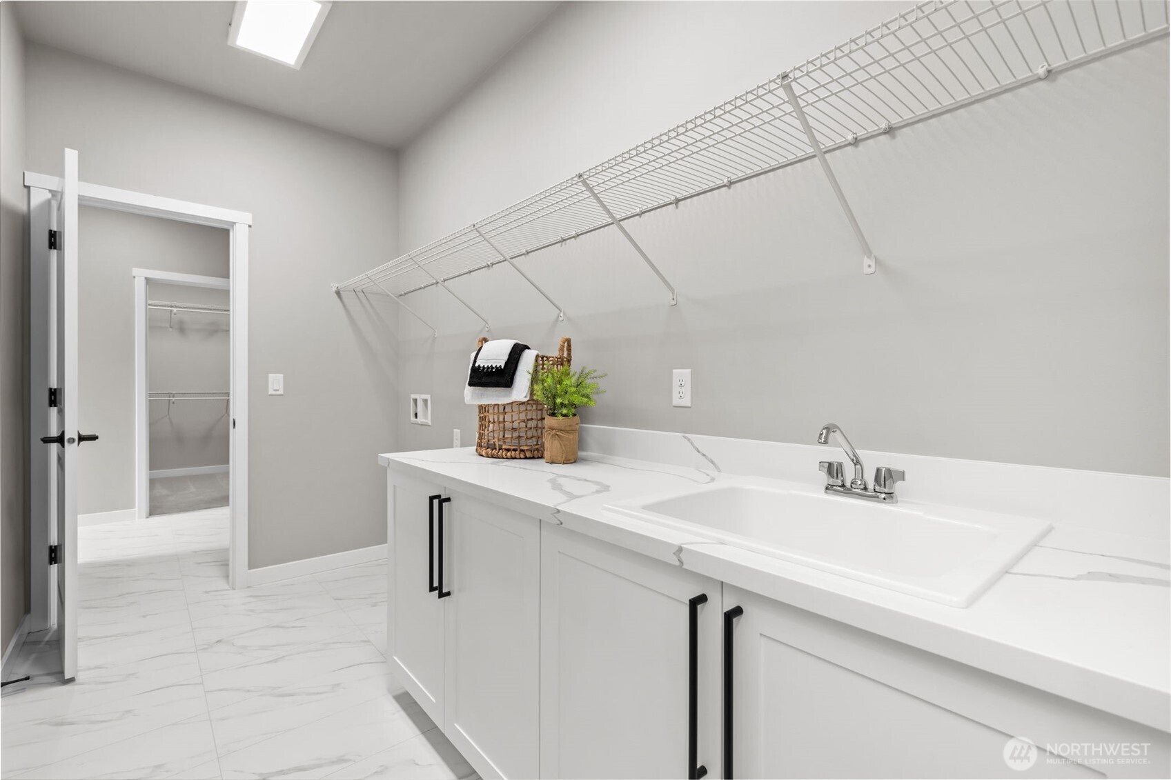 24224 Brier Road Brier, WA 98036 - Photo 17 of 19 a bathroom with a sink and a mirror