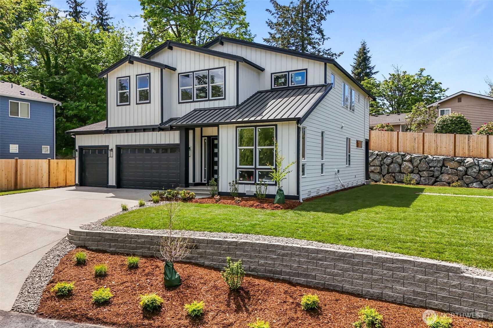 24224 Brier Road Brier, WA 98036 - Photo 2 of 19 a front view of a house with a yard and garage