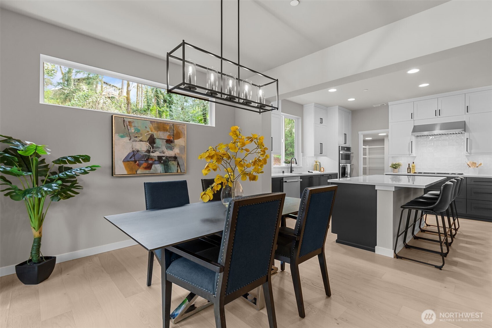 24224 Brier Road Brier, WA 98036 - Photo 4 of 19 a view of a dining room and chairs in a room