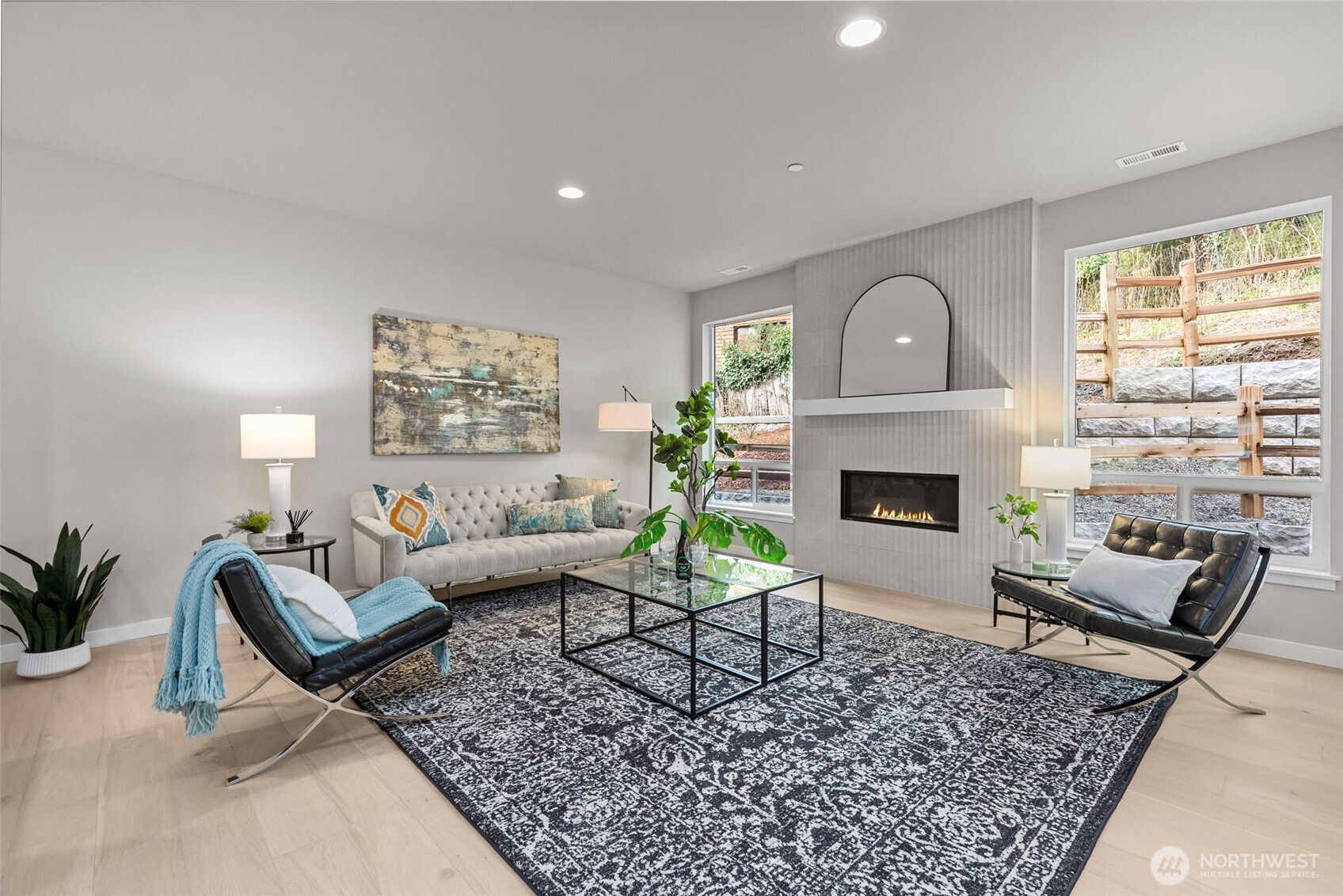 24224 Brier Road Brier, WA 98036 - Photo 5 of 19 a living room with furniture and a fireplace