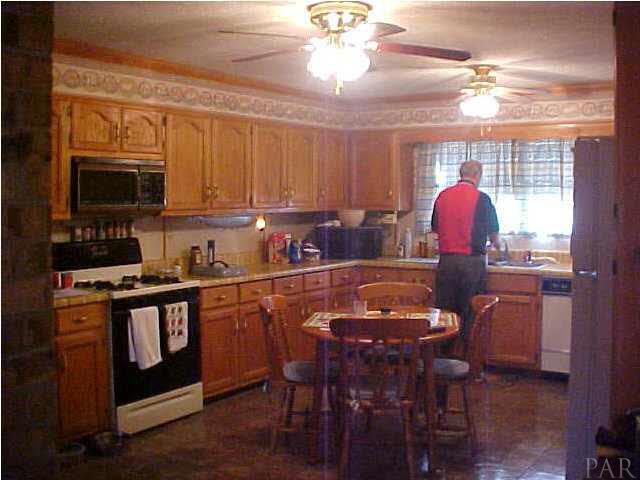 848 Nowak Road Cantonment, FL 32533 - Photo 3 of 5 Nice Kitchen with lots of oak cabinets