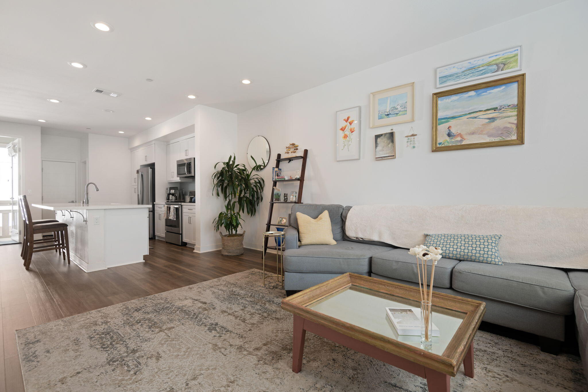 507 Bolinas Way, Unit 103 Goleta, CA 93117 - Photo 12 of 28 a living room with furniture and wooden floor