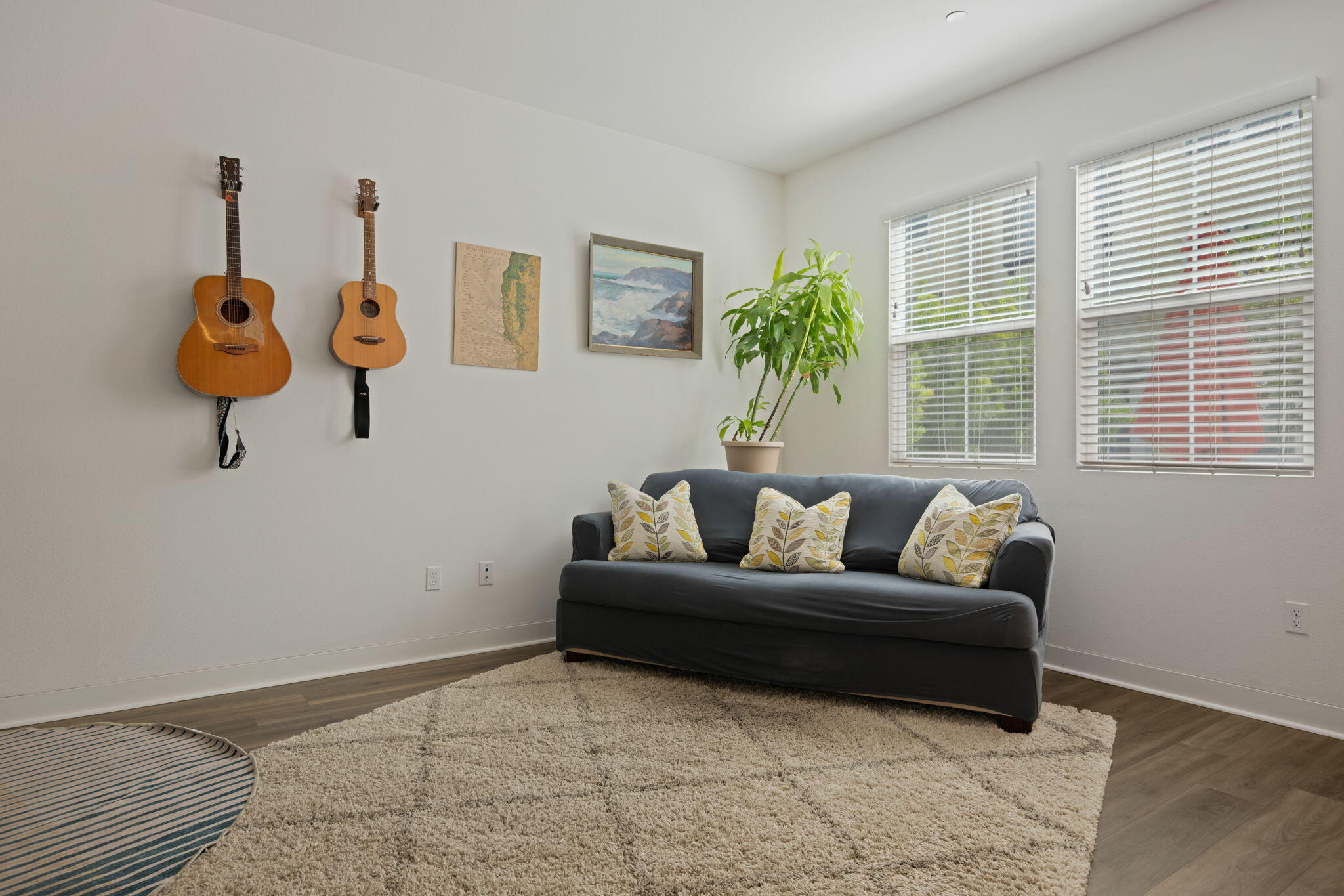 507 Bolinas Way, Unit 103 Goleta, CA 93117 - Photo 21 of 28 a living room with furniture and a window