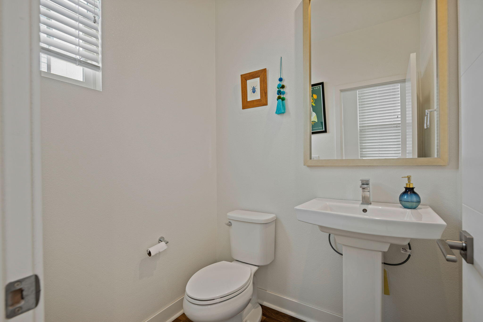507 Bolinas Way, Unit 103 Goleta, CA 93117 - Photo 22 of 28 a bathroom with a sink mirror and toilet